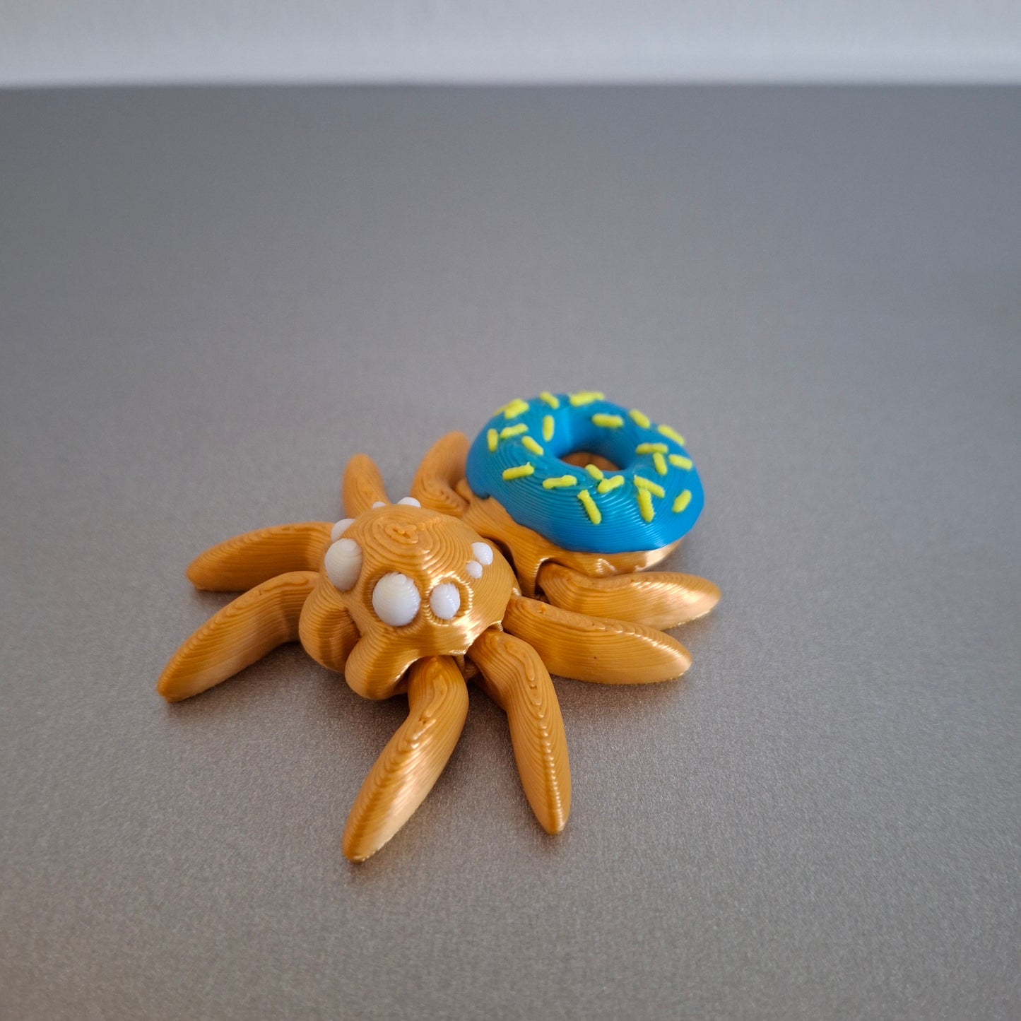 Mini Donut Edderkop - Blå, gul, hvid og guld